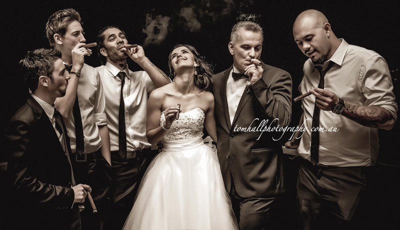 groomsmen-and-bride-smoking-a-cigar
